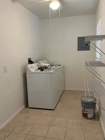 a utility room with washer and dryer