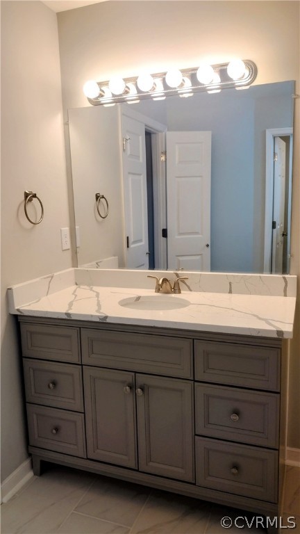 6000 Middlefield Place Chesterfield, VA 23832 - Photo 27 of 32 a bathroom with a sink and a mirror