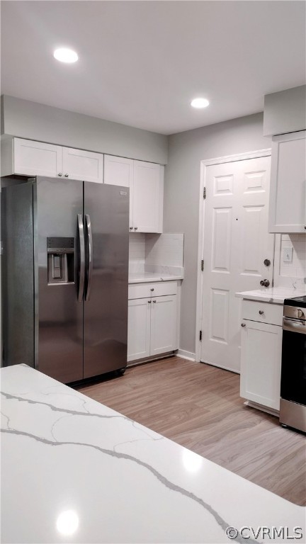 6000 Middlefield Place Chesterfield, VA 23832 - Photo 6 of 32 a kitchen with stainless steel appliances kitchen island a refrigerator sink and cabinets