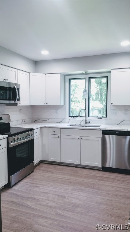 6000 Middlefield Place Chesterfield, VA 23832 - Photo 9 of 32 a large kitchen with granite countertop a stove top oven a sink and dishwasher a granite counter tops with wooden floors