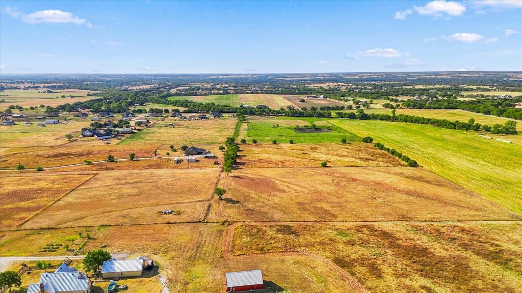 Tbd Cashs Mill Road Sanger, TX 76266 - Photo 13 of 21 Expansive agricultural land featuring a mix of cultivated fields and scattered trees