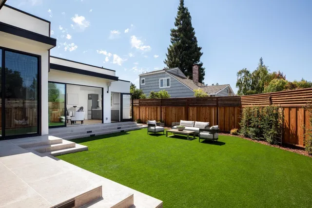 a garden view with a seating space