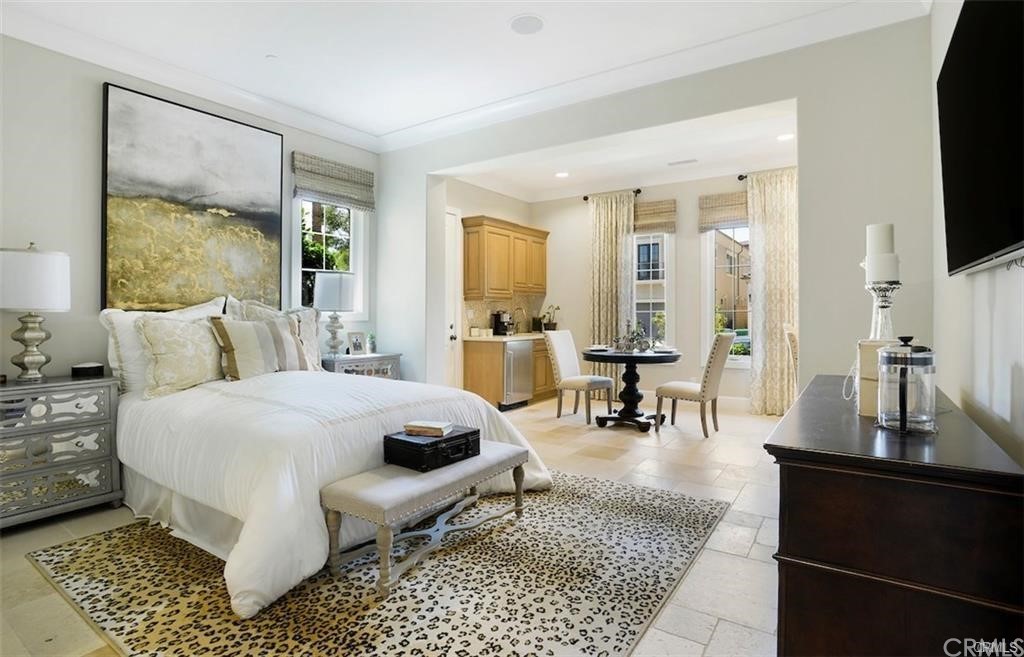 123 Amber Sky Irvine, CA 92618 - Photo 15 of 43 a living room with furniture and a flat screen tv