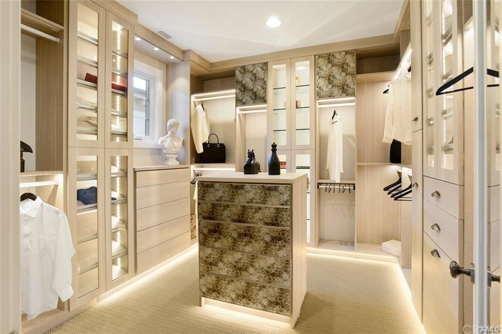 123 Amber Sky Irvine, CA 92618 - Photo 22 of 43 a bathroom with a shower