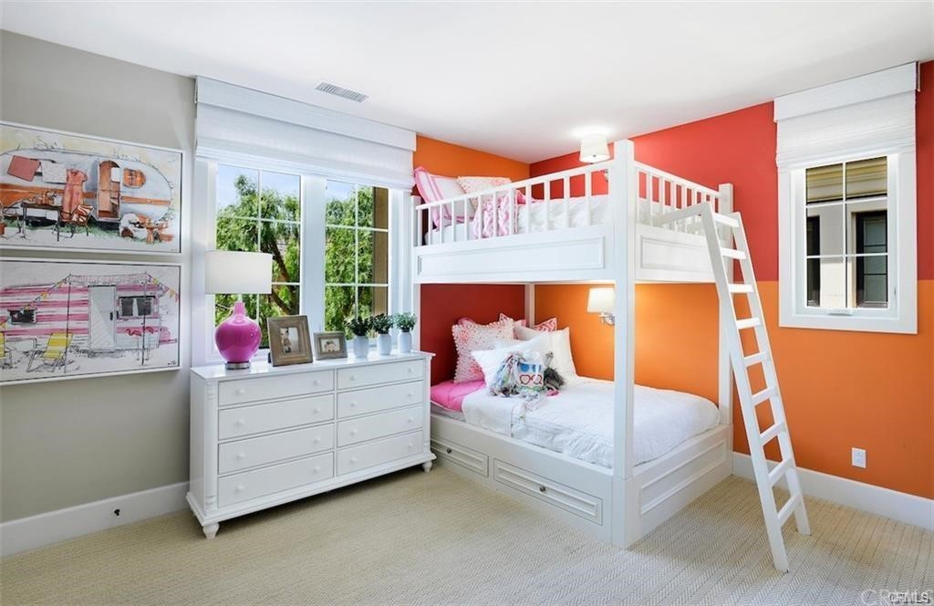 123 Amber Sky Irvine, CA 92618 - Photo 25 of 43 a bed room with a bed and a window