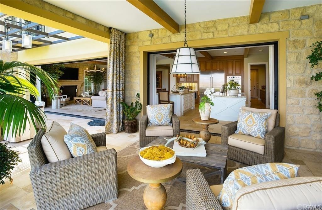123 Amber Sky Irvine, CA 92618 - Photo 35 of 43 a living room with furniture and a potted plant