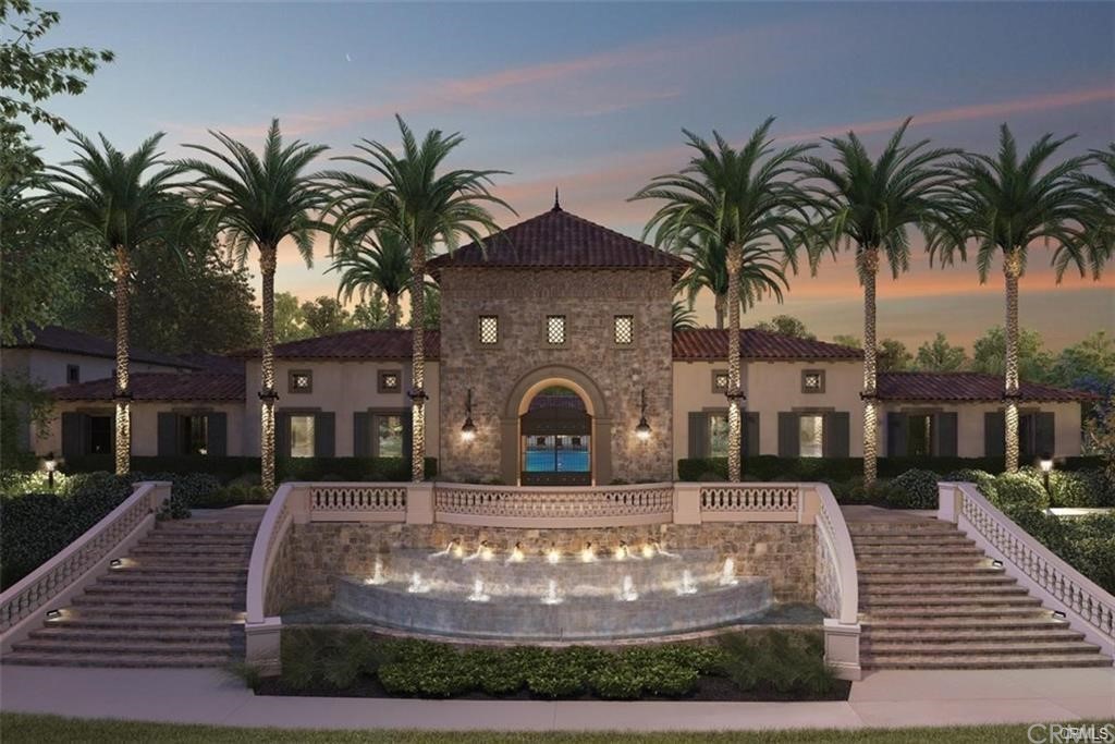 123 Amber Sky Irvine, CA 92618 - Photo 40 of 43 a front view of a house with garden