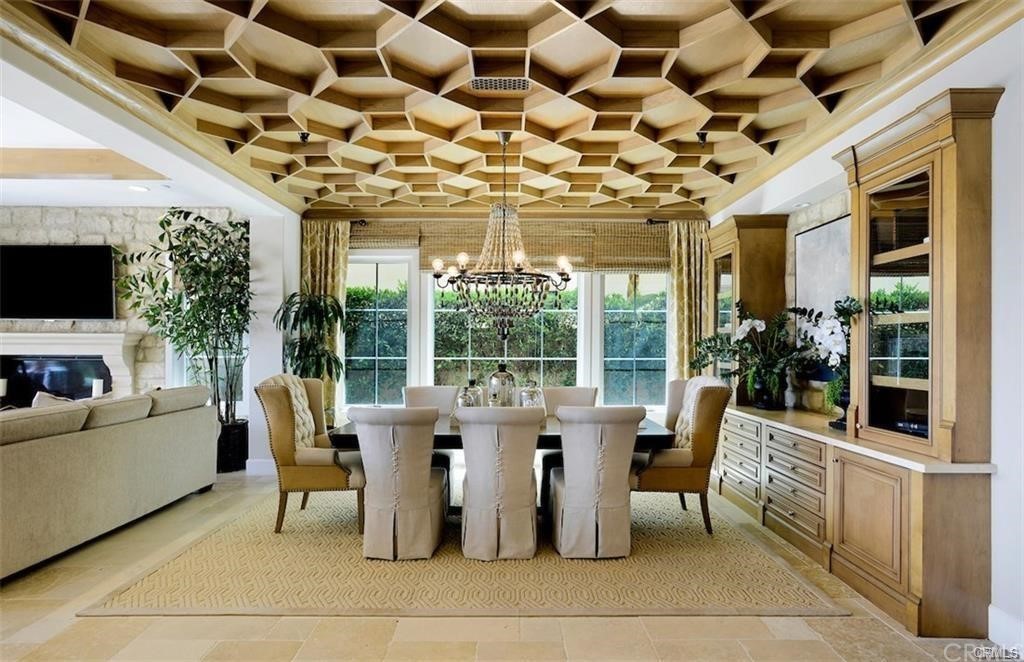 123 Amber Sky Irvine, CA 92618 - Photo 4 of 43 a view of a very nice looking dining room with furniture window and outside view