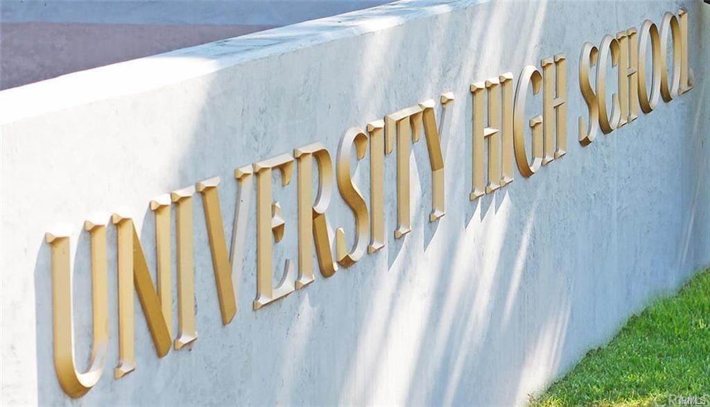 123 Amber Sky Irvine, CA 92618 - Photo 41 of 43 a view of staircase with wooden floor and stairs