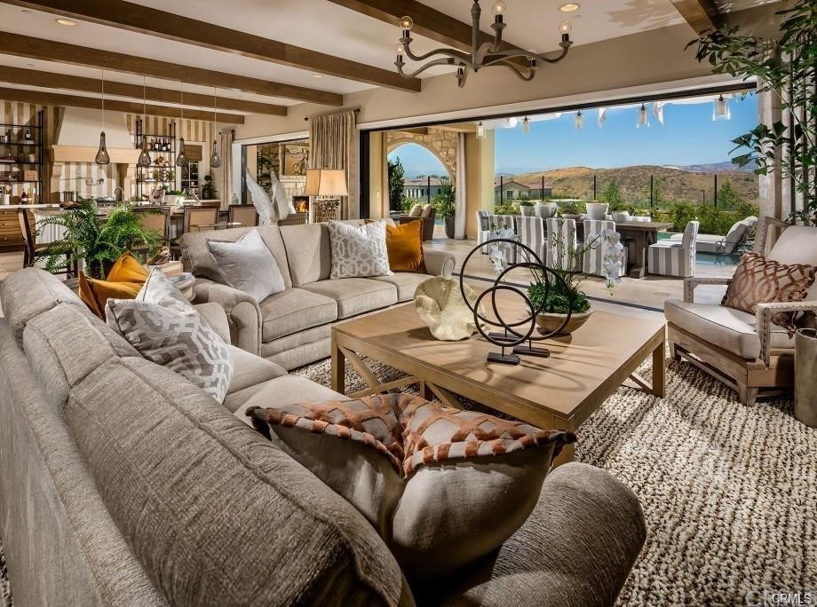 123 Amber Sky Irvine, CA 92618 - Photo 43 of 43 a living room with furniture and a table