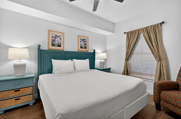 a bedroom with bed and window