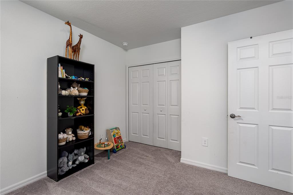 1912 Swivel Lane Sarasota, FL 34240 - Photo 20 of 48 a view of an empty room with shelves