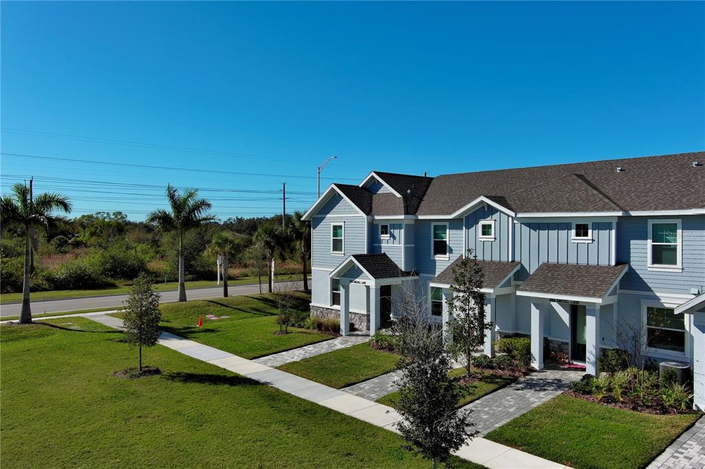 1912 Swivel Lane Sarasota, FL 34240 - Photo 26 of 48 a front view of house with yard and green space