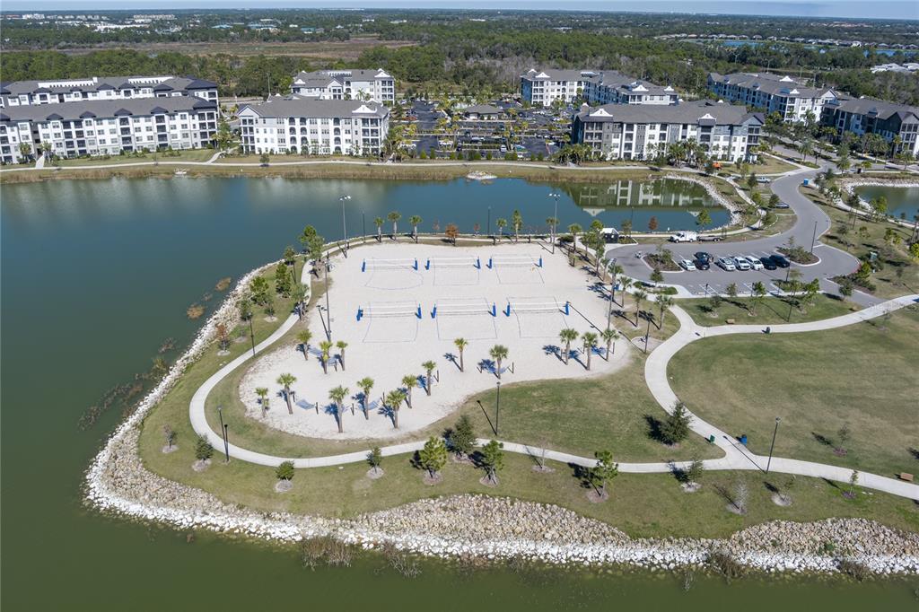 1912 Swivel Lane Sarasota, FL 34240 - Photo 44 of 48 an aerial view of a house with a lake view