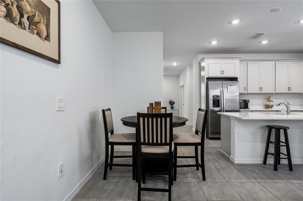 1912 Swivel Lane Sarasota, FL 34240 - Photo 9 of 48 a view of a dining room with furniture