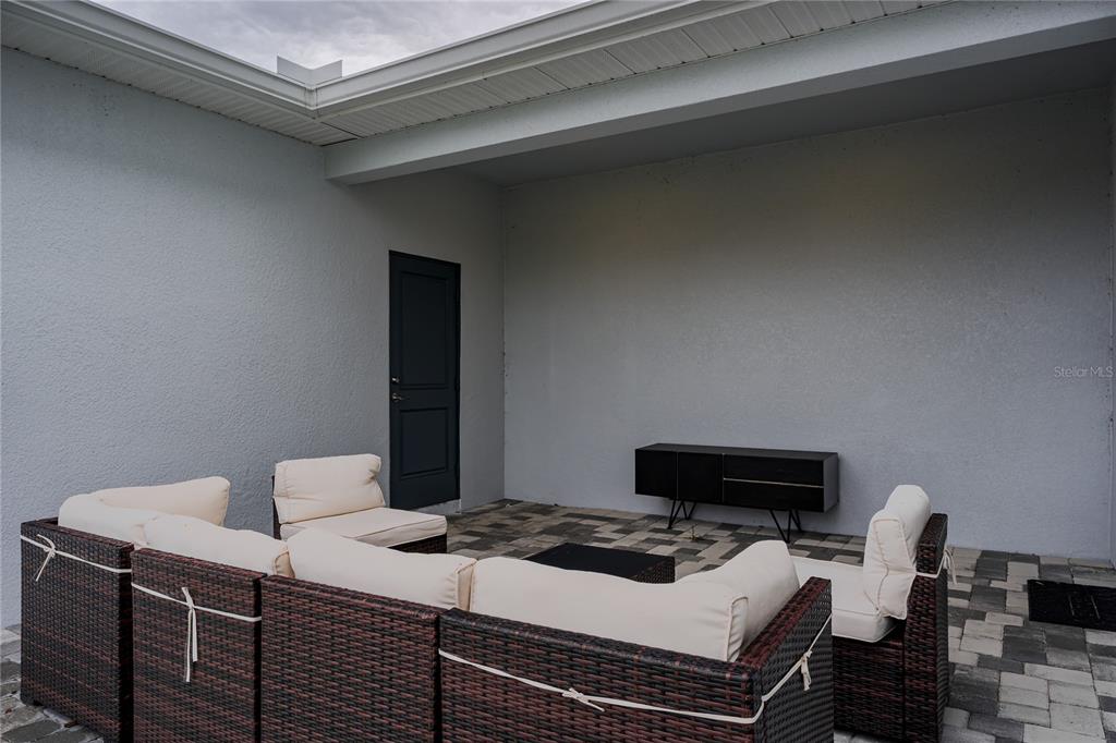 1912 Swivel Lane Sarasota, FL 34240 - Photo 10 of 48 a bedroom with bed and a dresser