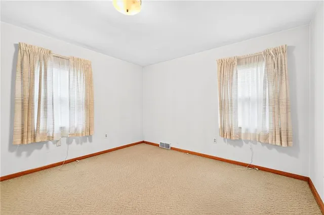 an empty room with window