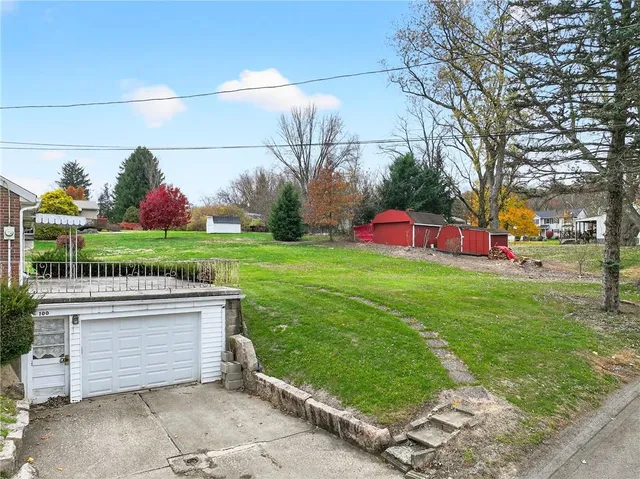 a view of yard with tree s