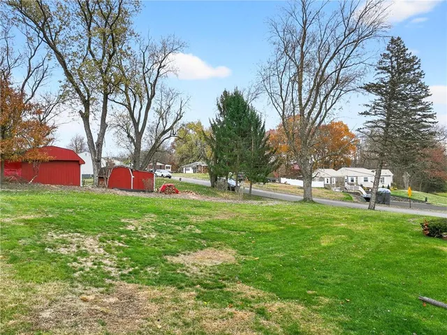 a view of a house with a big yard