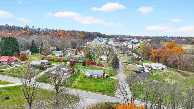 a view of a table and chairs in the balcony