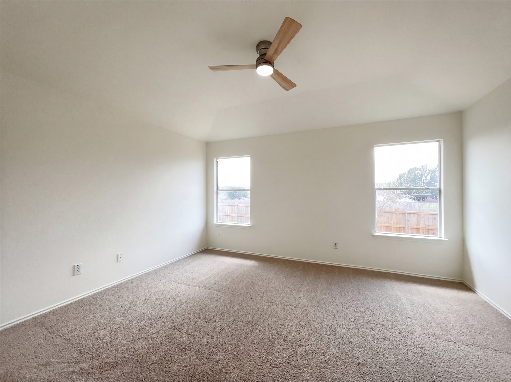 506 Gettysburg Loop Elgin, TX 78621 - Photo 26 of 39 an empty room with a window