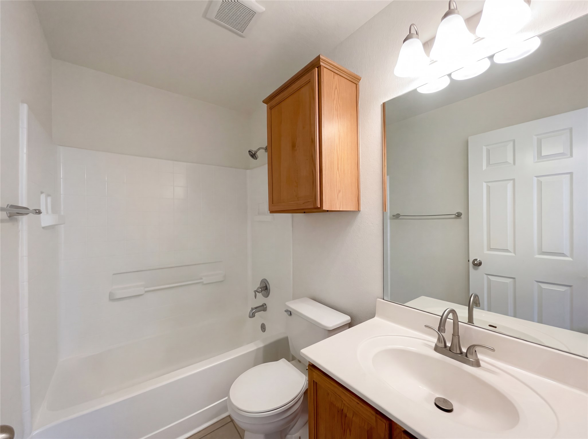 506 Gettysburg Loop Elgin, TX 78621 - Photo 30 of 39 a bathroom with a sink a toilet and shower