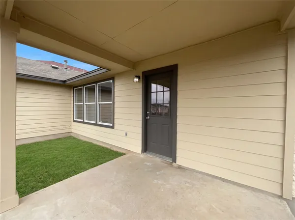 a picture of a bathroom with a shower
