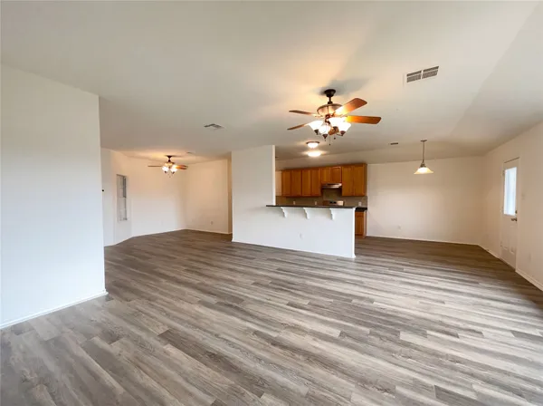 a view of a room with a flat screen tv