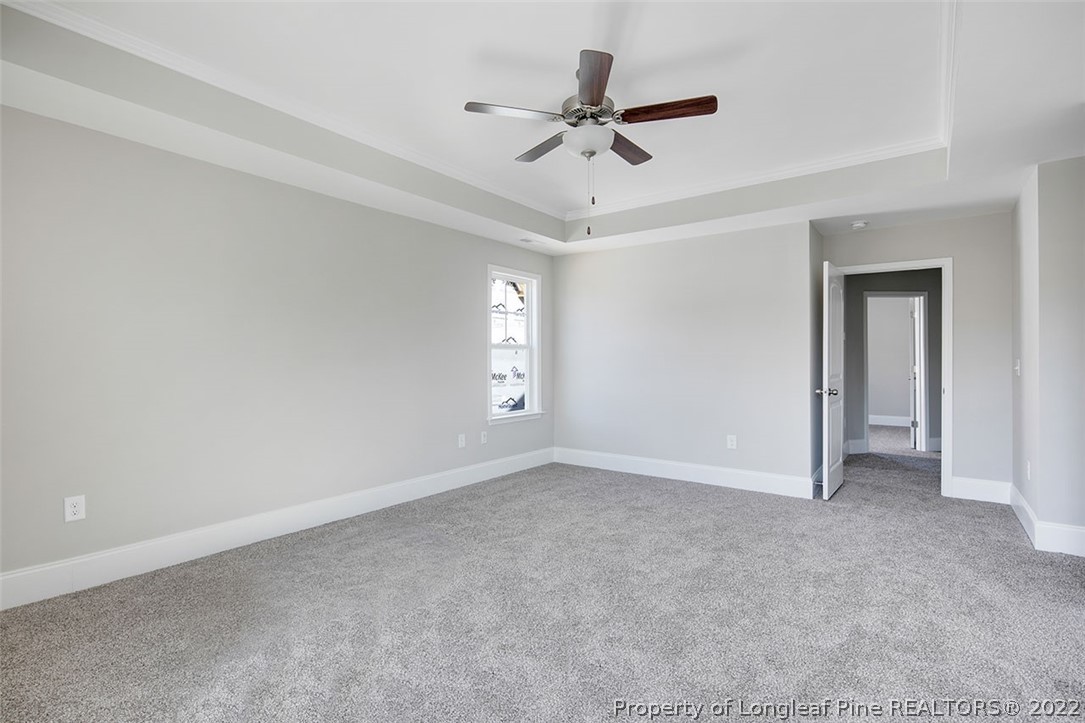 416 Kerr Lake Road Aberdeen, NC 28315 - Photo 23 of 45 a view of an empty room with a window
