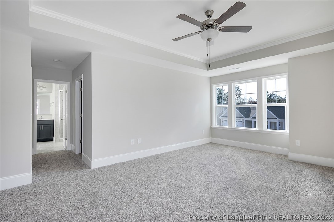 416 Kerr Lake Road Aberdeen, NC 28315 - Photo 25 of 45 a view of an empty room with a window