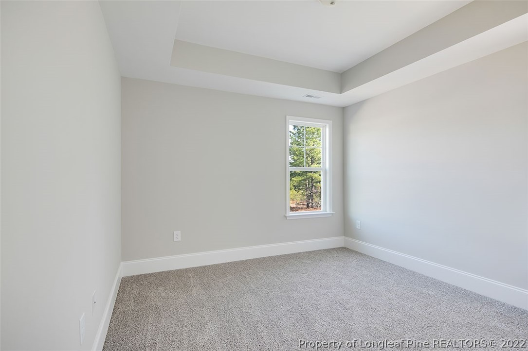 416 Kerr Lake Road Aberdeen, NC 28315 - Photo 35 of 45 an empty room with a window