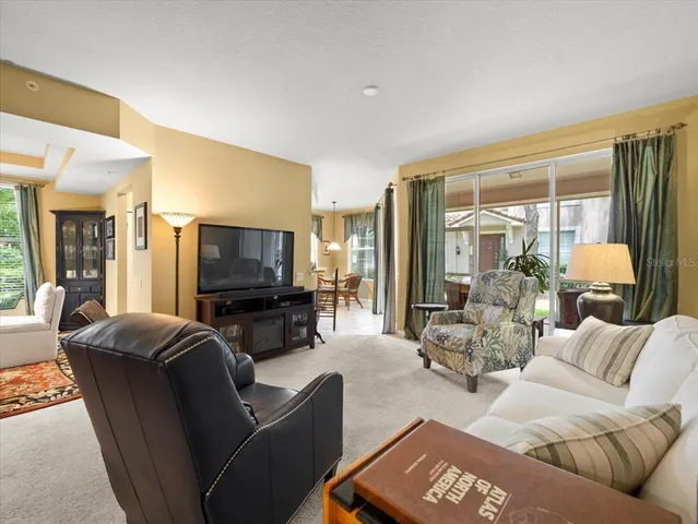 a kitchen that has a sink and a stove in it