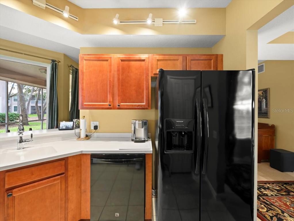 897 Lantern Way Clearwater, FL 33765 - Photo 22 of 56 a bathroom with a sink and a mirror