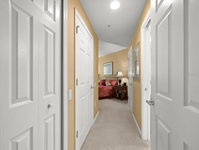 a bedroom with a bed and furniture