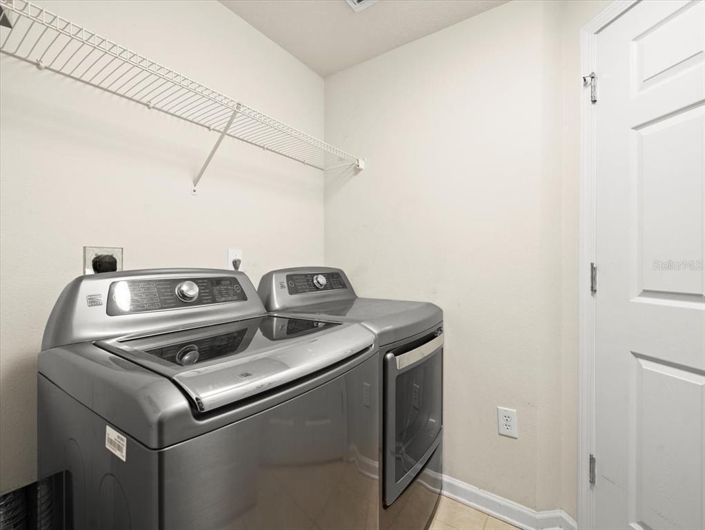 897 Lantern Way Clearwater, FL 33765 - Photo 45 of 56 a close up view of washer and dryer