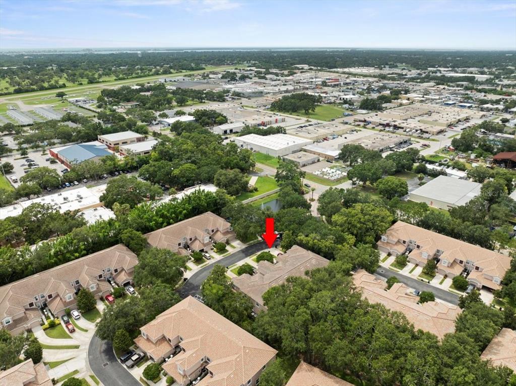 897 Lantern Way Clearwater, FL 33765 - Photo 50 of 56 an aerial view of residential houses with outdoor space