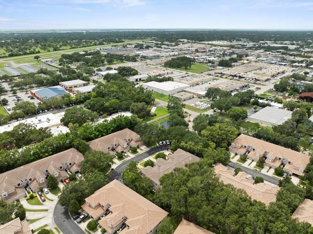 897 Lantern Way Clearwater, FL 33765 - Photo 55 of 56 an aerial view of residential houses with outdoor space