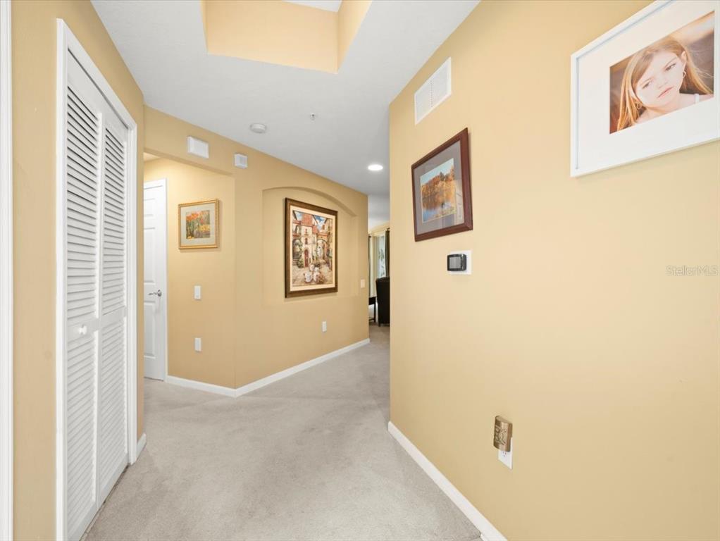 897 Lantern Way Clearwater, FL 33765 - Photo 7 of 56 a view of a hallway with front door