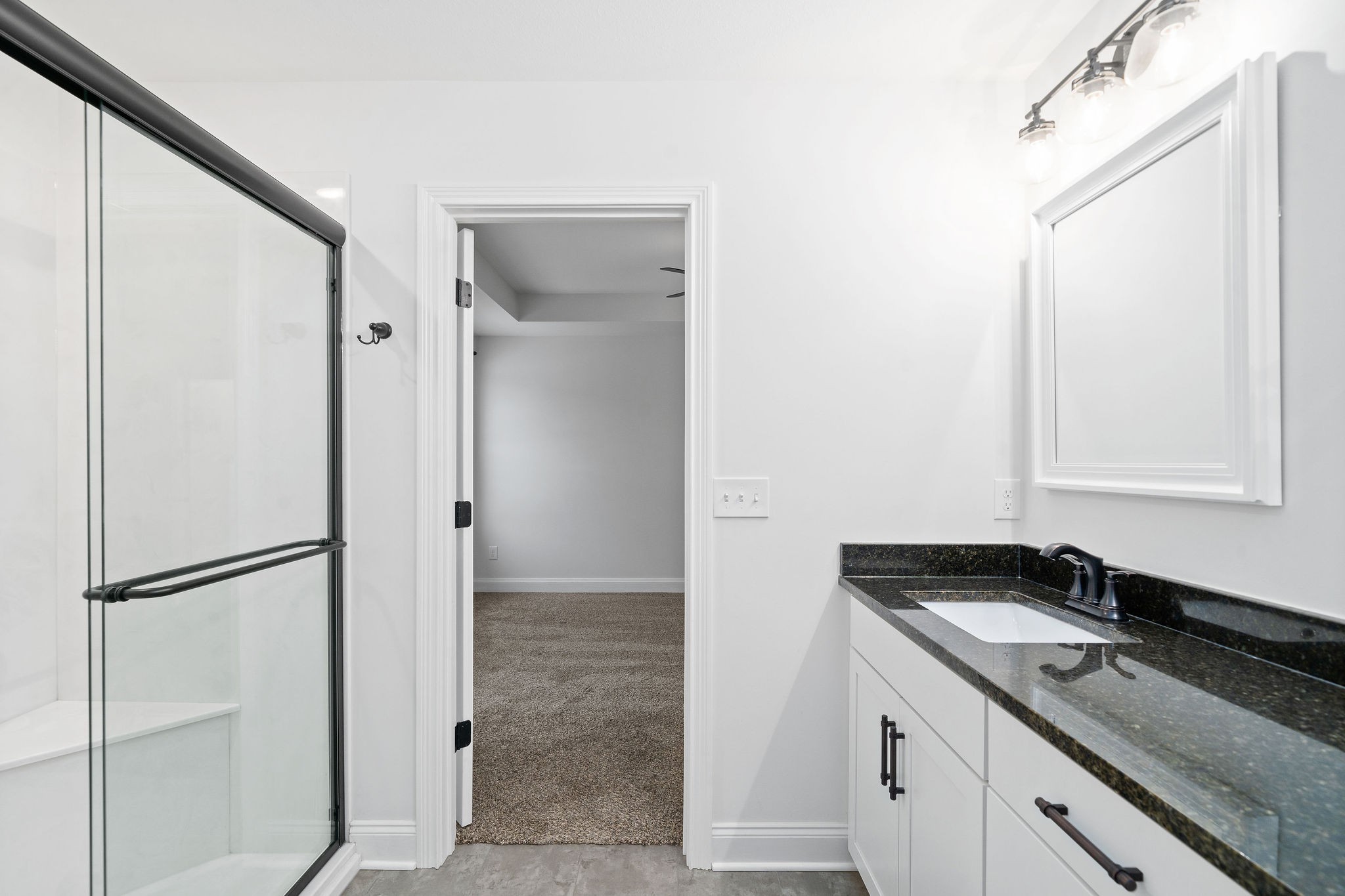 472 Hawkins Road Clarksville, TN 37040 - Photo 22 of 33 a bathroom with a sink and a mirror