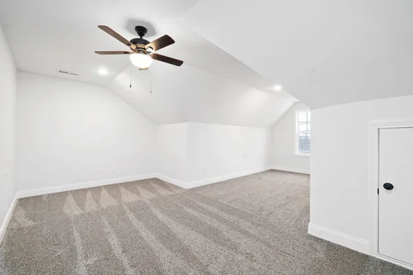 a view of a big room with carpet