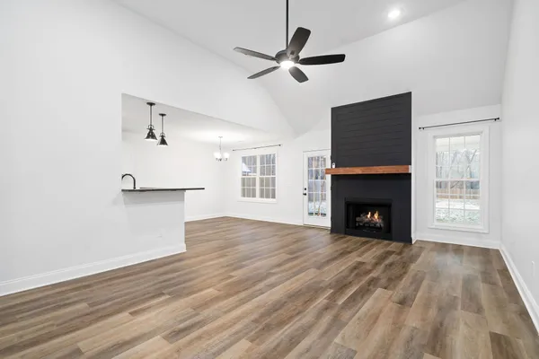 a living room with a fireplace