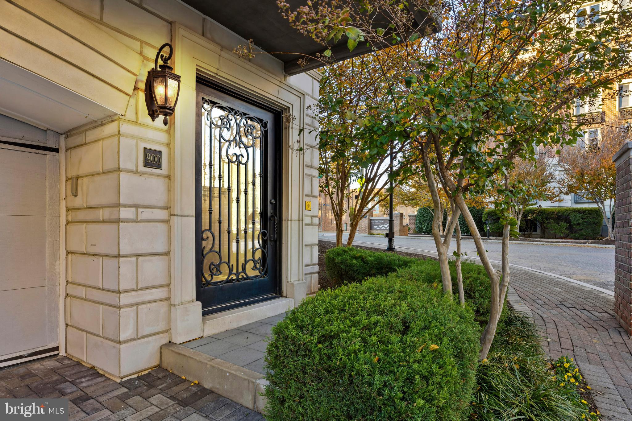 900 Valencia Court, Unit 188 Baltimore, MD 21230 - Photo 3 of 46 a front view of a house with a garden