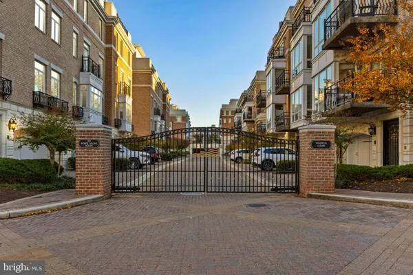 a view of a building with iron fence