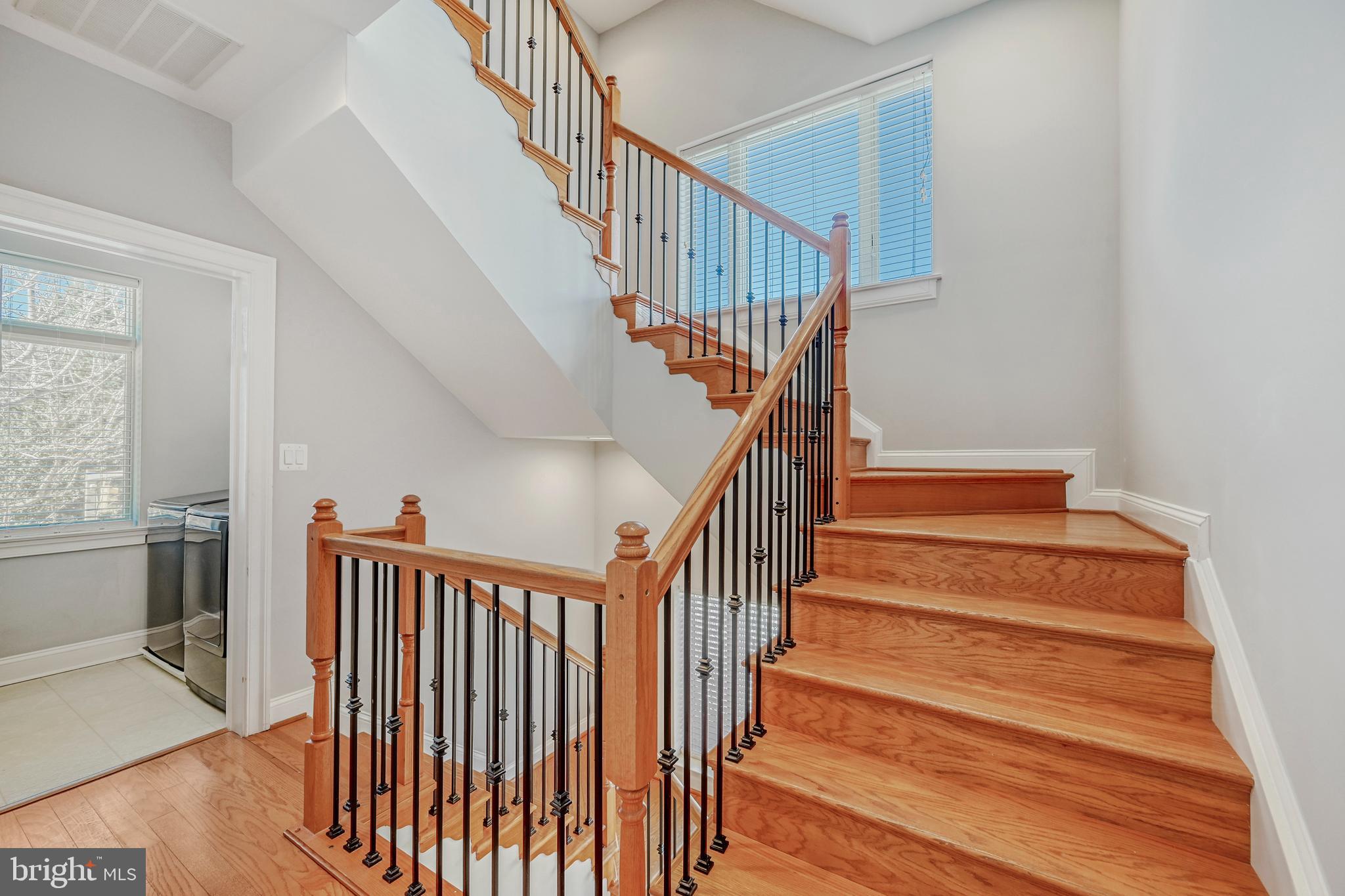 900 Valencia Court, Unit 188 Baltimore, MD 21230 - Photo 9 of 46 a view of entryway and hall with wooden floor