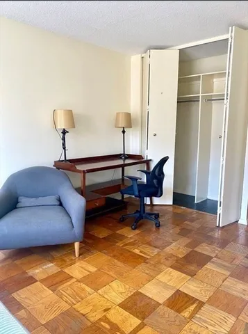 a view of workspace with lounge chair