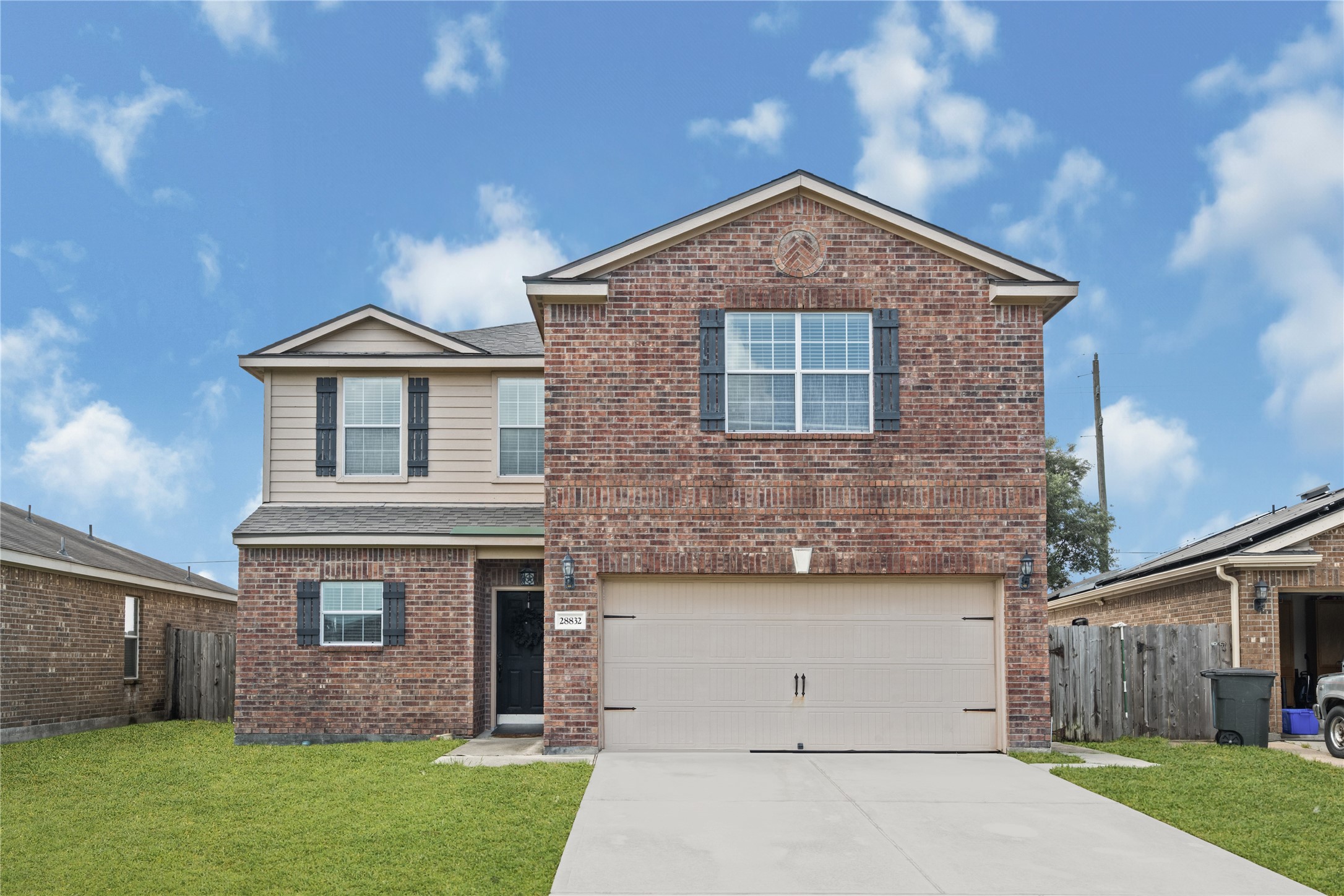 28832 San Bernard River Loop Spring, TX 77386 - Photo 2 of 50 a front view of a house with a yard and garage