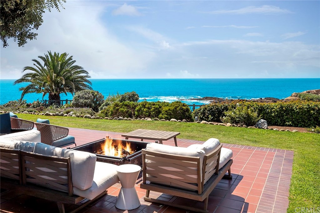 23 Montage Way Laguna Beach, CA 92651 - Photo 13 of 48 a view of a swimming pool and lounge chairs