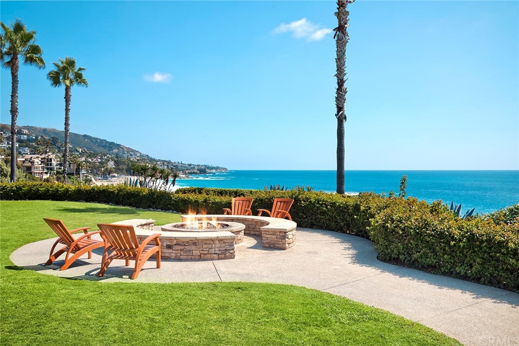 23 Montage Way Laguna Beach, CA 92651 - Photo 17 of 48 a view of a lake with couches chairs park table and chairs