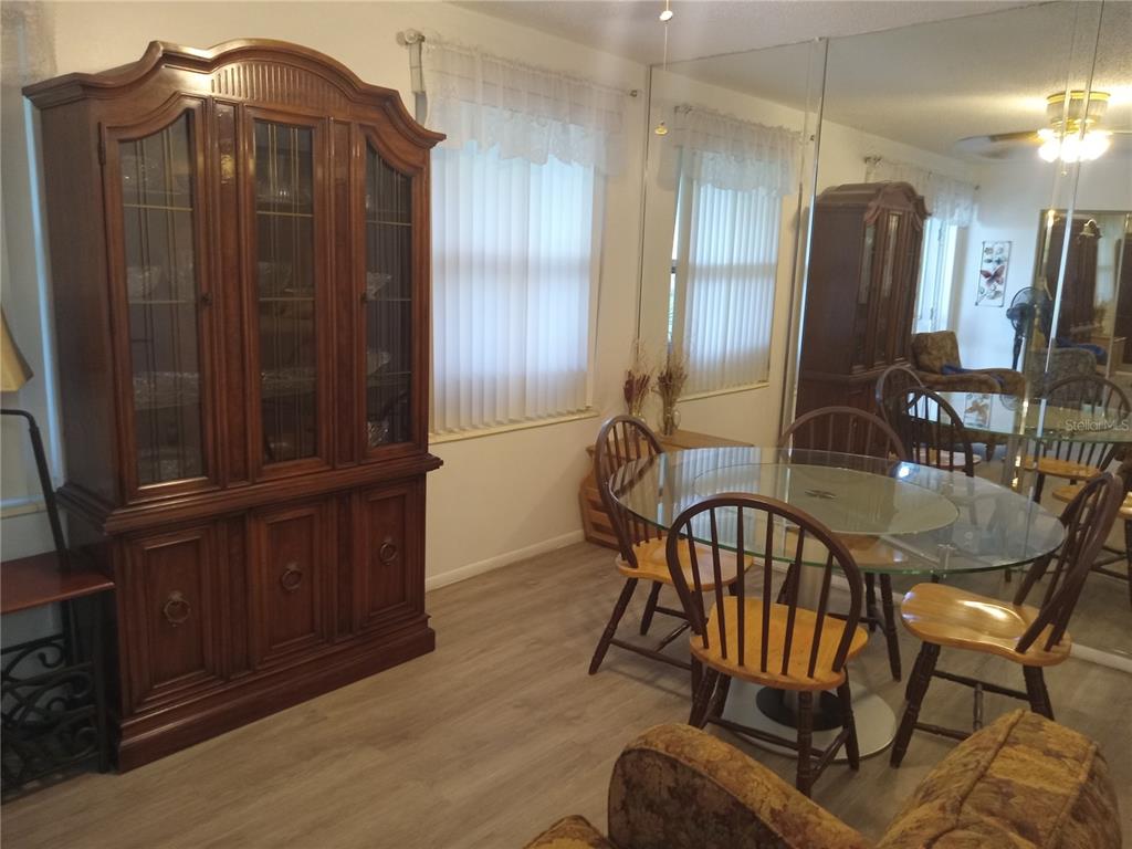 2467 Finlandia Lane, Unit 27 Clearwater, FL 33763 - Photo 20 of 58 a view of a chairs in a room