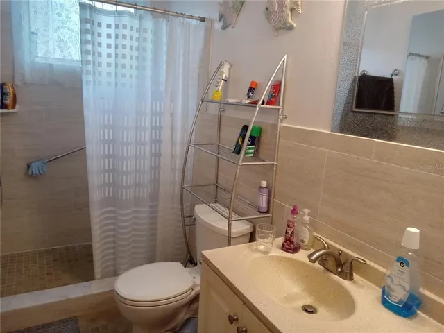 a view of a bedroom from a hallway